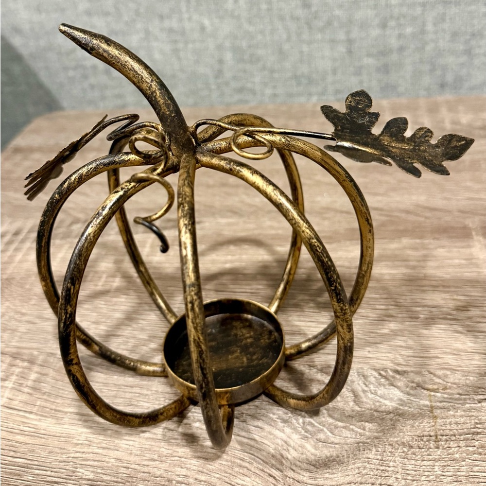Gorgeous brushed gold/copper pumpkin tea light holder. Very heavy. Like new!